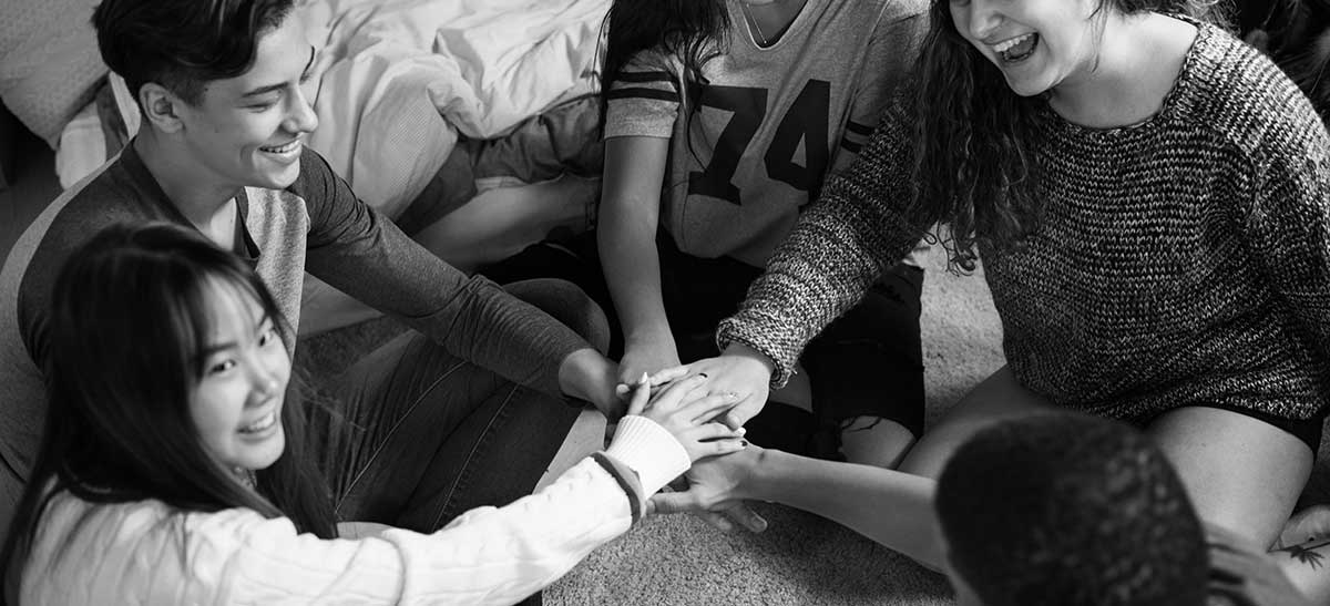 Group of young people working together